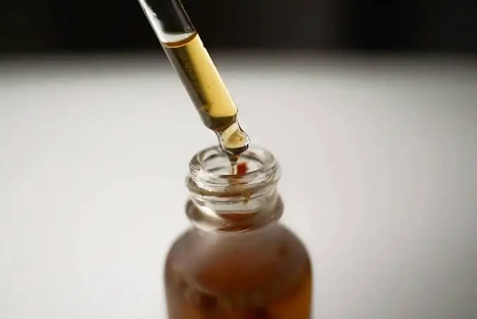 A dropper bottle used for precise sub-perceptual liquid measuring when learning how to microdose LSD